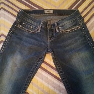 Size 25 long low rise bootcut jeans.
